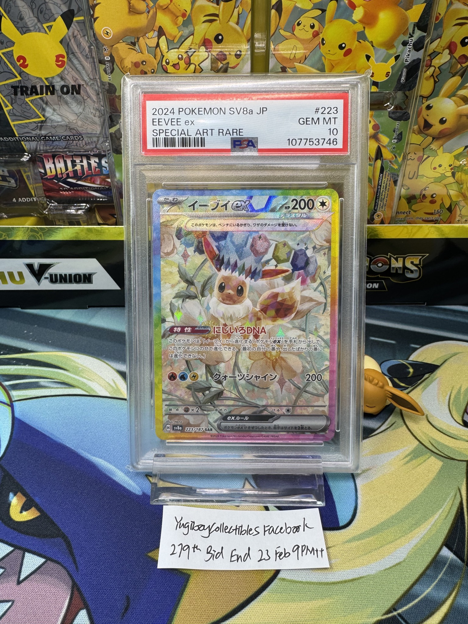 Eevee PSA auction reference with handwritten bid ending note
